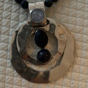 Chico’s oversize pendant necklace.